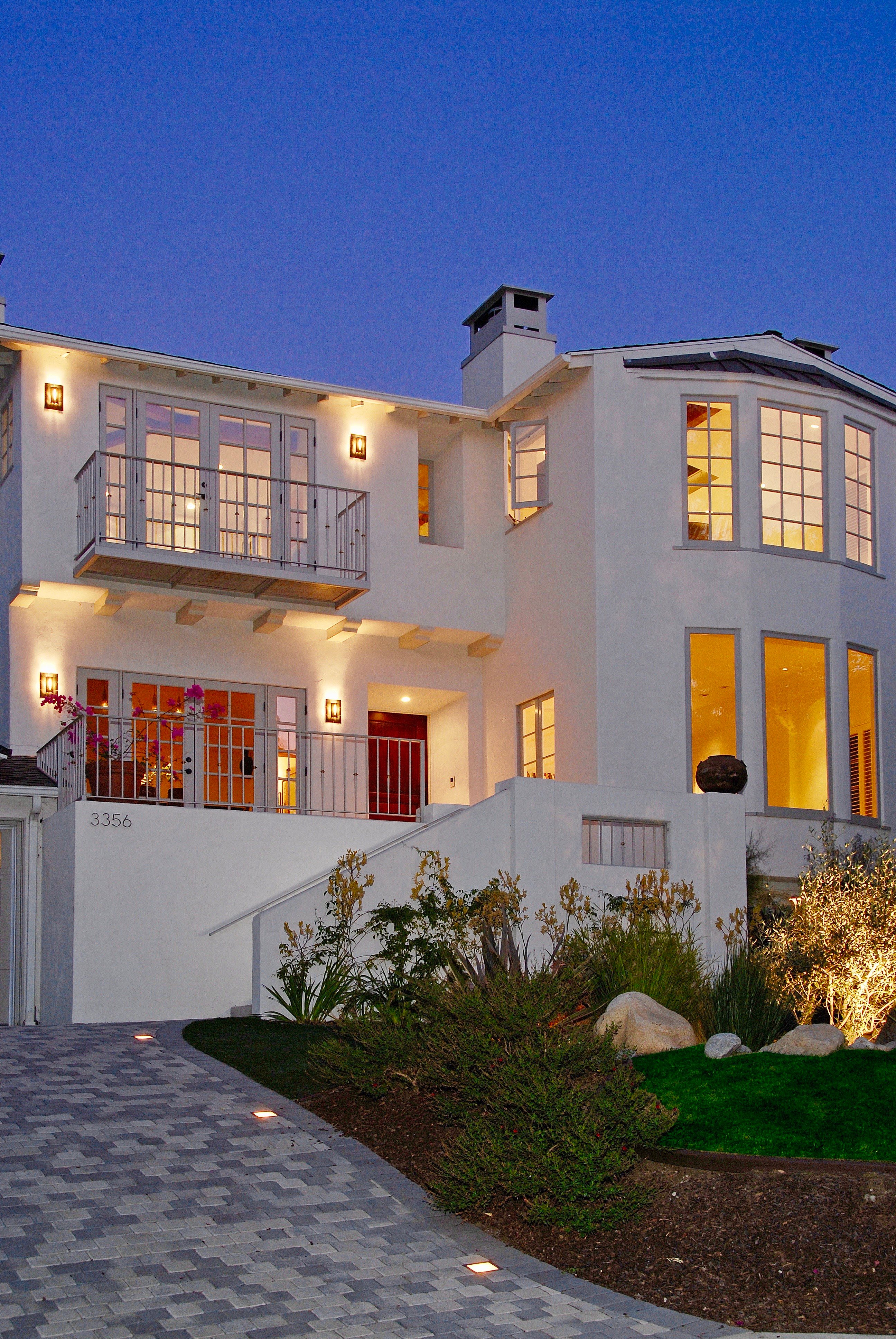 Mulholland hillside home by Donald Callahan Bryan — restored exterior at dusk