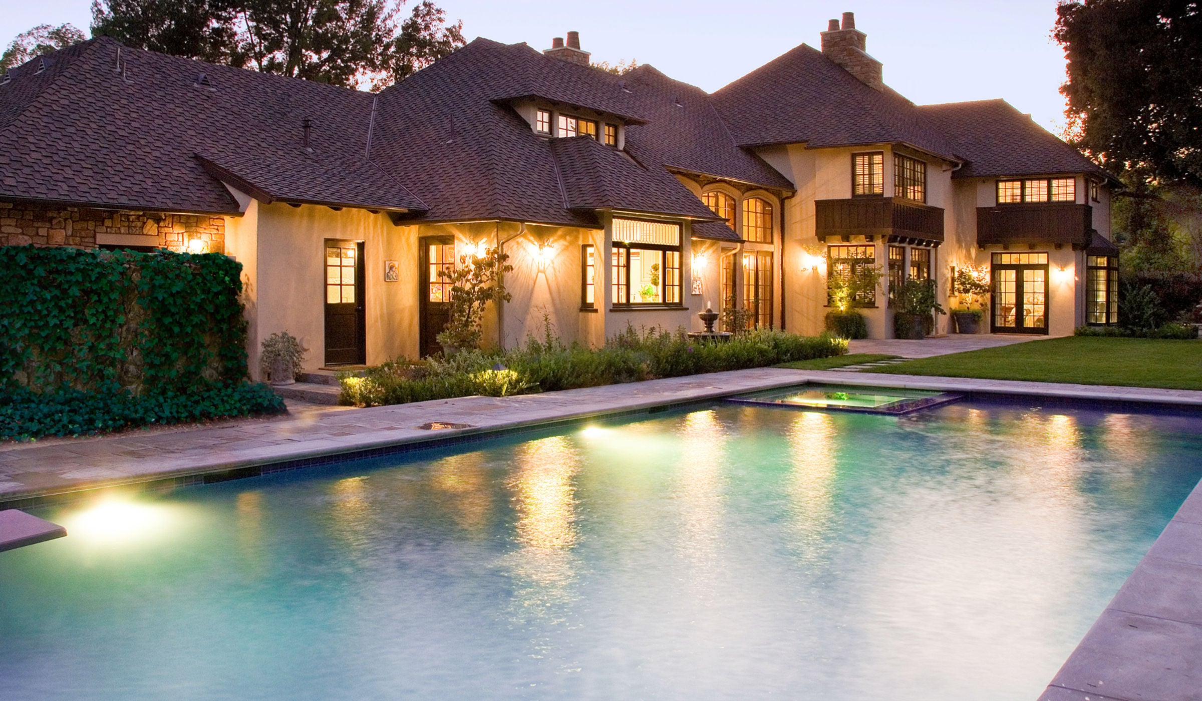 Luxury Southern California custom residence by Donald Callahan Bryan — pool and exterior at dusk